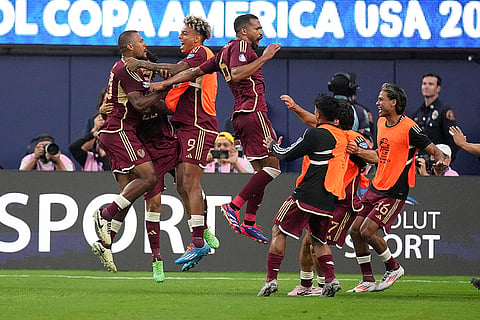 Salomon Rondon celebrates after scoring from a penalty kick